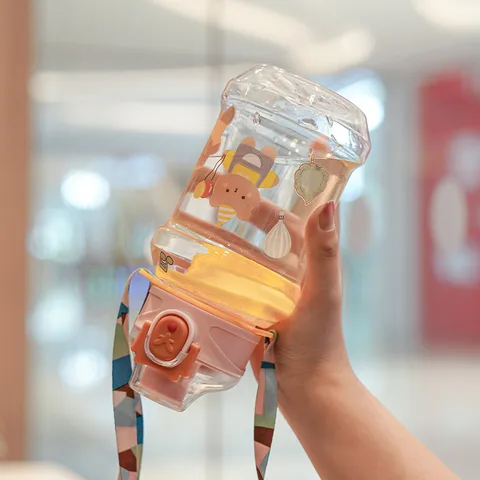 Transport pour enfants tasse à boire droit Un bouton bouchon à pression mignon dessin animé bouteille d'eau