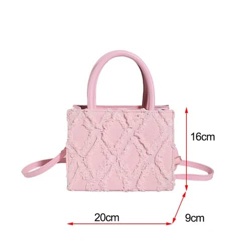 Sac à main en cuir brillant pour femme, fourre-tout à bandoulière de luxe.